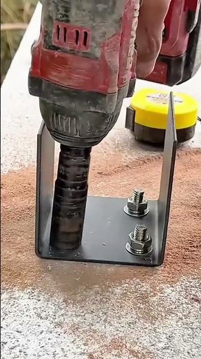 Installing metal bracket base with anchor bolts on concrete