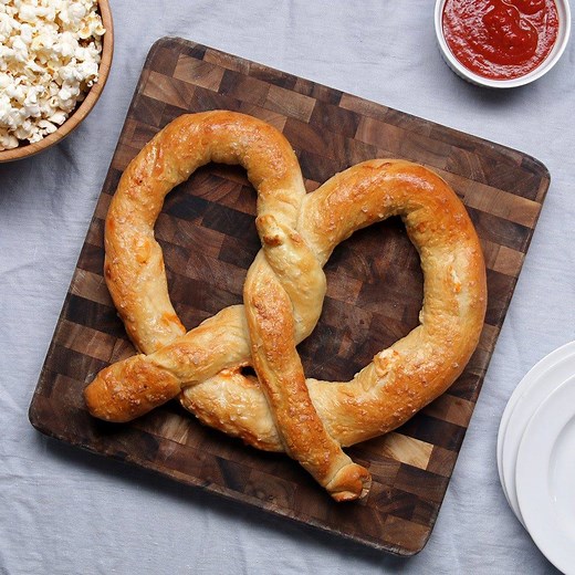 This giant multi-stuffed pretzel is full of suprises! 🥨 FULL RECIPE: https://tasty.co/recipe/giant-multi-stuffed-soft-pretzel | Tasty