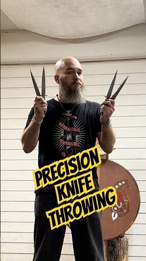 World Champion Knife Thrower throwing with precision