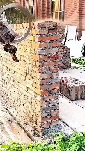 The process of demolishing buildings using automated machinery