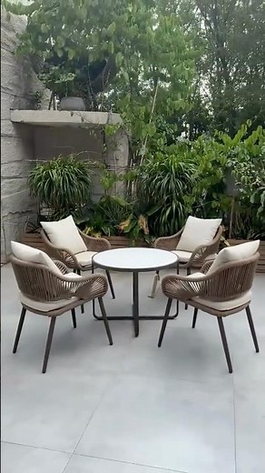 Modern Rope Woven Outdoor Dining Set with Round Table and Cushioned Chairs for Patio or Garden