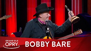 "Not a better place for Bobby Bare to be than here." — Garth Brooks We couldn't agree more! Watch Garth officially welcome Bobby back home. ❤️ | Grand Ole Opry