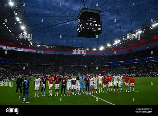 18 April 2026, Hesse, Frankfurt/M.: Soccer, Men: Bundesliga, Eintracht Frankfurt - RB Leipzig, Matchday 30, Deutsche Bank Park. The RB Leipzig players cheer with the fans after the match. Photo: Florian Wiegand/dpa - IMPORTANT NOTE: In accordance with the regulations of the DFL German Football League and the DFB German Football Association, it is prohibited to utilize or have utilized photographs taken in the stadium and/or of the match in the form of sequential images and/or video-like photo se