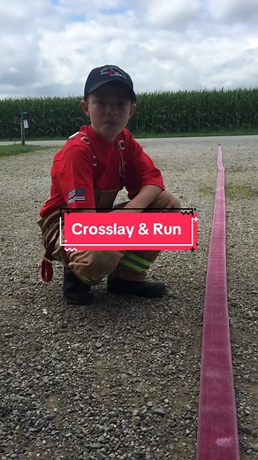 How to fold a crosslay and then run with it #littlefirefighter #quinn #fireman #quinnfireman #lilstation5 #littleliberty #hoseroll #crosslay