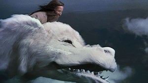 Falkor and the song from The NeverEnding Story haven’t aged a bit. Atreyu, not so much. | Spotify