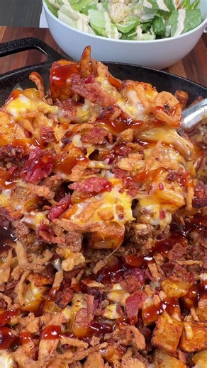 I want easy dinners that are the complete opposite from all the holiday food for at least the next 30 days. This dinner was easy, delicious, and the family loved it! INGREDIENTS 5 small/medium potatoes olive oil salt, pepper, garlic powder, and paprika (for potatoes) 1 lb ground beef 1 onion, chopped 1/2 tsp each of salt, pepper, ground mustard 1 tsp each of onion powder, garlic powder, smoked paprika 1 tbsp minced garlic 2 tbsp Buffalo Wild Wings Honey BBQ sauce Shredded Colby Jack cheese 6 pie