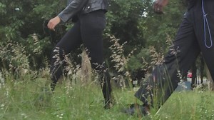 Two people walking slowly among herbs - Free Stock Video