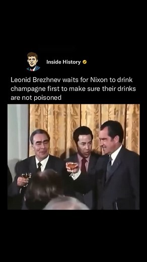 Inside History on Instagram: "Leonid Brezhnev stands with a practiced air of composure, his eyes fixed intently on Richard Nixon as the two leaders raise their champagne glasses. Though the occasion is diplomatic and ceremonial, a flicker of caution betrays Brezhnev’s steely demeanor. He subtly hesitates, waiting for Nixon to take the first sip. It’s a silent gesture—rooted in Cold War distrust—meant to ensure the drink is safe, untainted by the unseen threats that often haunt political theater.