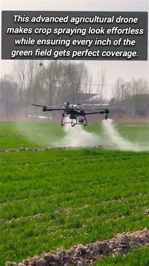 Modern Agricultural Drone Spraying Fertilizer Over Vast Green Fields