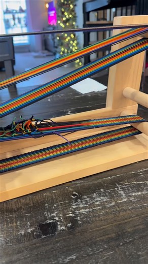 Christy Bullock on Instagram: "A bit more about the weaving process using an inkle loom- I use it to make guitar straps, camera straps, and keychain wristlets. The terminology was overwhelming at first, and it was hard to find resources online to learn, so let me know if you have questions and I’ll try to answer them 🙂 Some inkle loom terminology: Warp Weft Shuttle Beat Shed Heddle/heddled Unheddled #inkleloom #weaving #weavingtutorial #handmade #fiberart"
