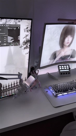Stylish PC Setup: Goth Aesthetic with White Keyboard