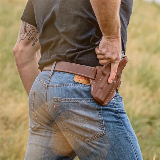 A Holster Worthy of Your 1911 🤠 Meet The Everyday Cowboy... originally crafted for the 1911, it blends a classic Western look with everyday carry comfort that no modern holster can rival. Cocked & locked in premium leather that matches its beauty. The way your 1911 deserves to be carried. Celebrating 73 Years 🇺🇸 Save 20% on your entire cart! Use code COWBOY at checkout. Explore the Lineup 👇🏼 huntercompany.com/products/everyday-cowboy-ccw-holster-5300-series | Hunter Company