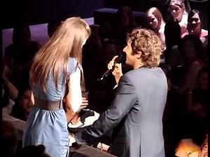 Josh Groban singing ``To Where You Are`` with audience member Maude Montréal, July 23th, 2011