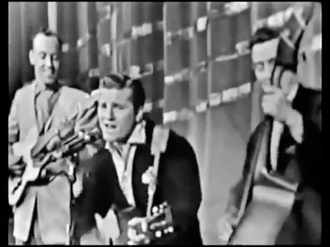 April 8, 1956 — A blast of raw, rockabilly energy hit American television when The Johnny Burnette Trio made their first of three standout appearances on Ted Mack's Amateur Hour on ABC-TV. Their weapon of choice? A fierce, no-holds-barred rendition of "Train Kept-A-Rollin’." Long before it became a staple for bands like The Yardbirds and Aerosmith, this was the original freight train of rock 'n' roll — gritty, relentless, and powered by the slap of the upright bass and a driving guitar that woul