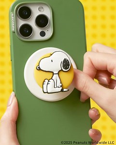 💛 Turn your phone into a classic Peanuts comic strip with the 📱 PopOut Sitting Snoopy phone grip…yes, it is MagSafe 🧲 | PopSockets