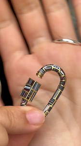 Fordite is a material that comes from layers of excess car paint from car factories. When you cut the slabs open you don’t know exactly what you’ll find so each cut is one of a kind. It is unbelievably light and unbelievably colorful and with we make Locks, discs, cylinders, charms, boxes, and use it for inlay, too. No photo, ours included, will ever do it justice, and our work with it will never be done. There is something so poignant about using something discarded and reimagining it as someth