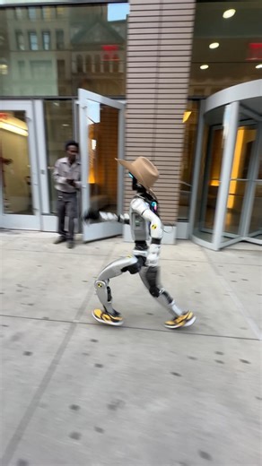 Rizzbot on Instagram: "Robot running around the streets of NYC #robot"