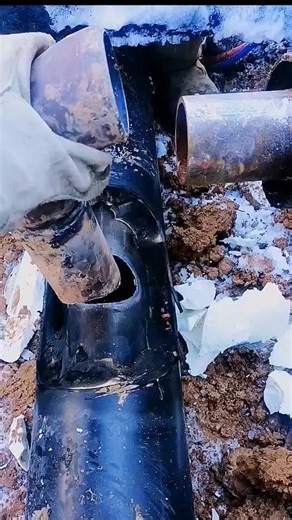 Mechanic Repairs Pipe: A Close-Up Tutorial