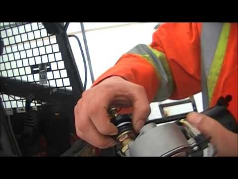 Windshield wiper motor install on skid steer