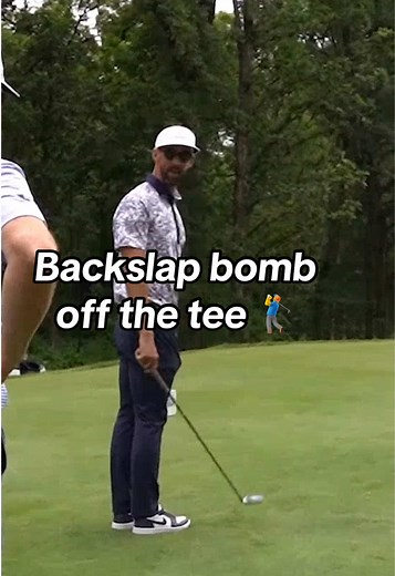Michael Phelps' Unique Backslap Golf Warmup