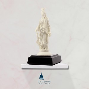 This 5” replica of the Statue of Freedom is formed from 1865 marble that was removed during a 1995 restoration of the East Front steps of the House of Representatives wing. The Statue of Freedom is the crowning feature of the Capitol Dome. It stands 19 feet 6 inches tall and weighs approximately 15,000 pounds. Bring home a piece of American history from the U.S. Capitol Visitor Center Gift Shop. | U.S. Capitol Visitor Center