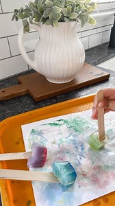 FROZEN PAINT WATERCOLORS! 🧊 Need a quick summer at-home activity for your kids? These DIY watercolors are fun and easy. Plus, how cool?! After Roo was done, I stuck the ice tray back in the freezer, so the paint cubes could refreeze and be ready for another round of painting! 👏🏼 I’d recommend this activity for children ages 3 and up. Sweet little Mo (19 months) kept trying do lick them like a popsicle! 😅 #summeractivities #preschoolactivities #paintingwithkids #easyactivities #watercolors | 