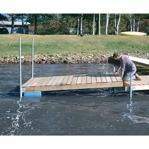 Need an extra hand installing or taking out your dock? Tommy Docks Flotation Log is a valuable tool for installing and removing dock sections. Grab yours today! 😎 | Tommy Docks