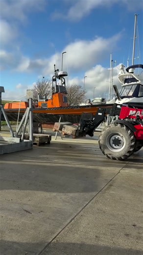 Elfie Lifting Pallets Across the Yard