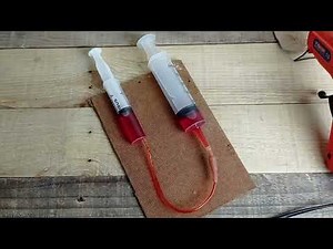 Hydraulic piston school science experiment - Pascal Law