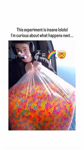@mr_.memes_duniya on Instagram: "The post features a 15-second viral video of a helicopter dumping bags of colorful Orbeez (superabsorbent polymer beads) into the ocean, creating a massive rainbow swirl on the water's surface, captioned in Japanese as a "crazy experiment" that leaves viewers curious about the aftermath. - Replies highlight environmental concerns, with users warning about risks to marine life as Orbeez do not biodegrade and can choke or starve fish and birds by mimicking food; a