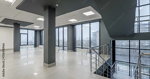 loop rotation and panoramic view in empty modern hall with columns, doors and panoramic windows overlooking the city.