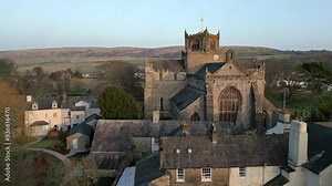 Slow Motion clip of the Cumbrian medieval village of Cartmel showing the historic Cartmel Priory at sunset