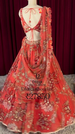 Vikas dhir on Instagram: "A fiery orange base elevated with bold metallic embroidery and a perfectly balanced flare. Statement craftsmanship that shines with confidence, movement, and modern grandeur. Perfect for wedding functions, sangeet nights, cocktail evenings, reception celebrations, and grand festive gatherings. #dchlehenga #lehenga"