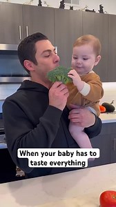 Curious baby eagerly taste-tests absolutely everything offered