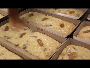 The HAPPY CAKE! Hawaii's most famous pineapple and macadamia nut fruit cake!