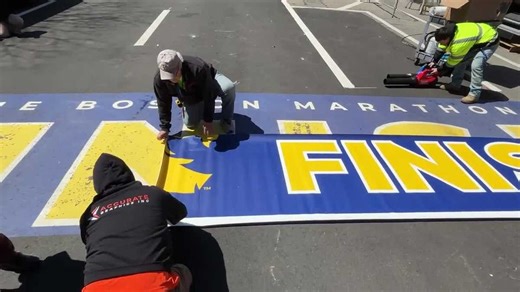 Video: Crews apply finishing touches to Boston Marathon finish line