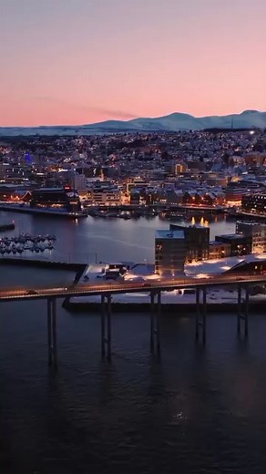 THE ICONIC TROMSØ BRIDGE was the first cantilever bridge to be built in Norway. Since then, many bridges of this type have been built. The bridge is one of the most important landmarks of Tromsø, and forms part of a motif composed of the Arctic Cathedral, the Tromsdalstinden mountain, and the Tromsø Bridge. In 2000, the Directorate for Cultural Heritage protected the bridge against modifications. We love it ! Video by the iconic eagle @vegasti1 🦅 #tromsolove | Tromsolove