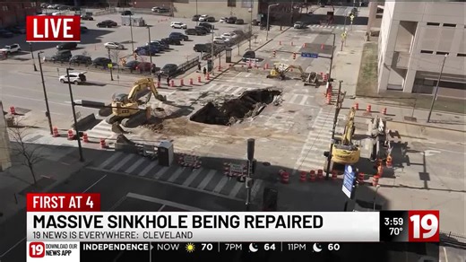 Massive sinkhole in downtown Cleveland nearly swallows car