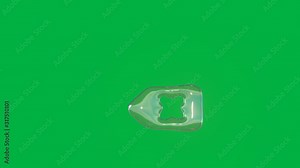 seamless loop 4k 3D rendering of distorted transparent soap bubble in shape of symbol of backspace button with cross floating in air isolated on green screen