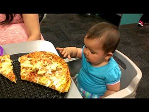 Baby Mariah's first time to Chuck E Cheeses eating pizza @ 8 Months