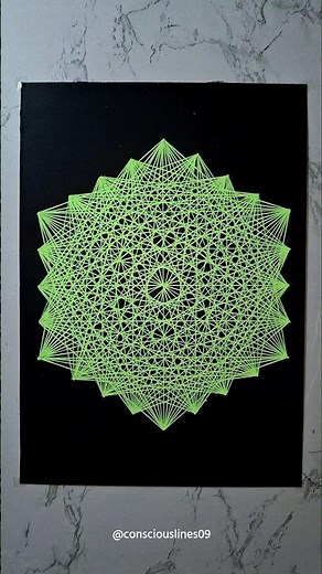 Mesmerizing Fluorescent Geometric String Art on Black Paper