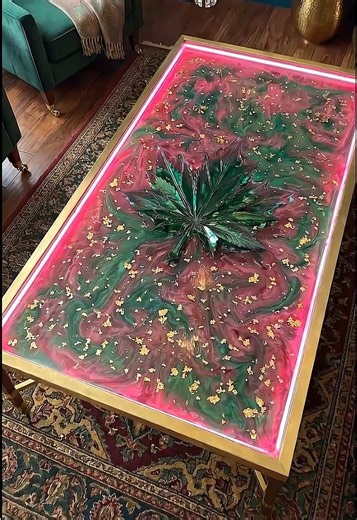 This glowing plant-shaped crystal epoxy table is pure luxury! 🌿✨ Wait for the end... The ultimate satisfying ASMR resin transformation! Watch this incredible static mold setup come to life. Centered around a stunning green plant-shaped crystal glass, this piece evolves into a breathtaking highly blended marble texture of green and pink epoxy. Accented with metallic gold flakes and locked in with a custom glowing LED edge, this Epoxy Depths masterpiece redefines modern high-end home decor. Would
