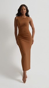 This dress smooths, cinches and transforms in seconds. Just step in. | Miraclesuit