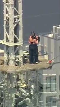 2 people climb atop Empire State Building, appear to get engaged