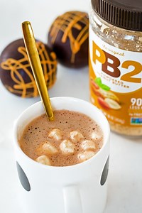 Peanut Butter Hot Chocolate Bombs Before the weather starts warming up, we wanted to share this fun and creative recipe that LeelaLicious created using PB2 Original. These Peanut Butter Hot Cocoa Bombs are fun and easy to make. You just need a few ingredients and patience to make this fun cold weather treat! Get the recipe here: https://pb2foods.com/portfolio-item/peanut-butter-hot-chocolate-bombs-recipe/ Purchase PB2 Original here: https://shop.pb2foods.com/products/pb2-original-powdered-peanut