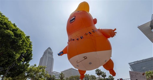 "No Kings" demonstrators protest President Trump during Army parade