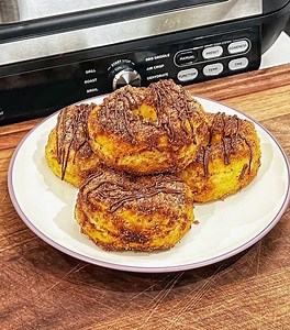 Use your air fryer to make amazing donuts! CJ breaks out his air fryer to make these awesome donuts! Using old school Pilsbury biscuits, some sweet sugar mix and a little chocolate to make donuts! What do you make in your air fryer that isn't the norm? | Cooking with CJ