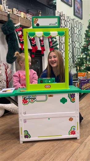 Theresa Anne Goebel - Menting on Instagram: "Breaking the internet with cuteness… and NO it’s not AI! Watching Lila write her own script and help edit this video reminds me why we love Girl Scouts . The Cookie Program teaches girls goal setting, decision making, money management, people skills, and business ethics—building confidence, resilience, and real-world entrepreneurship skills that last far beyond cookie season. 💚🍪 Lila is selling Girl Scout cookies and would love your support in reach