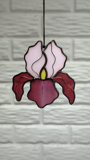Waxing and buffing is an important final step in the long stained glass process, to get a nice, shiny finish. #artprocess #process #art #howitsdone #stainedglass #Iris #pink #glass #glassart #wax #buff | Samantha Ashley Glass