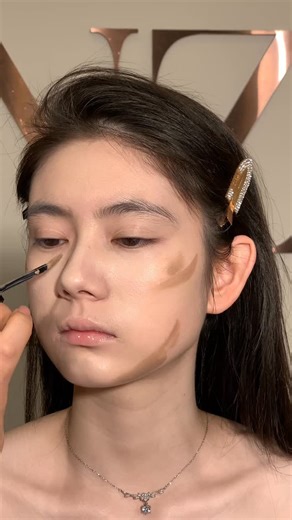 Mina Studio on Instagram: "In this video, I’ll show you a simple and effective contouring technique to enhance the natural structure of the face. From nose contour to cheekbones and jawline, every step is designed to create a soft, lifted, and naturally defined look. Perfect for beginners or anyone who wants a clean, subtle sculpted finish. ✨"